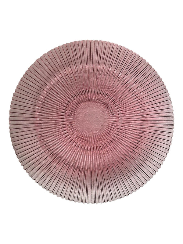 The Solara Pink Charger Plate is a round glass plate in pink, featuring a textured radiating line pattern that creates a modern sunburst effect—a striking addition to your tableware.