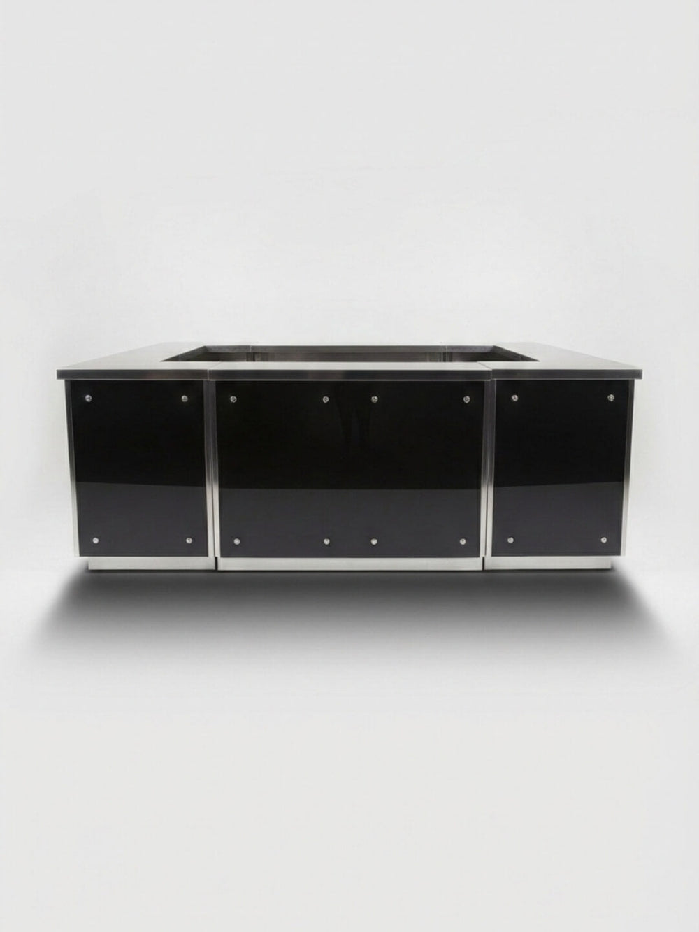 The Stainless Steel Modular Bar features a modern black and silver finish, three front-facing doors, metallic edges, and visible screws for a minimalist industrial style, photographed against a plain white background.