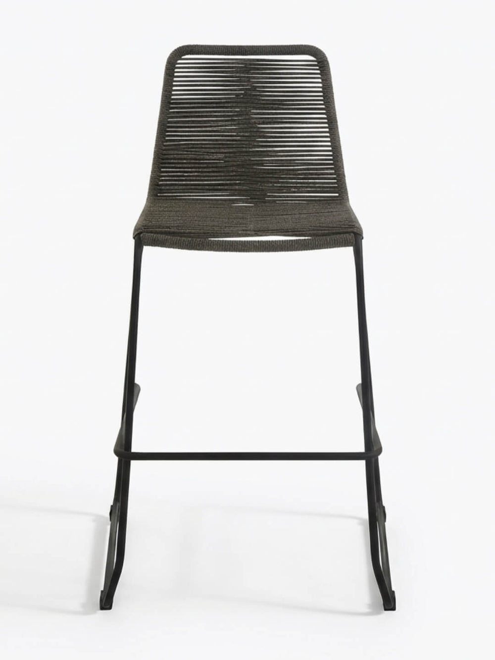 The Tide Bar Stool features a black metal frame with a tightly handwoven dark rope seat and backrest, shown against a plain white background—ideal for stylish outdoor bar seating.