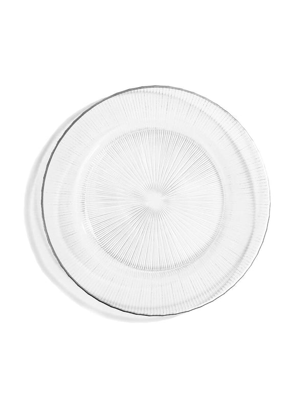 The Verto Silver Charger Plate features clear glass with a textured, radiating line pattern and a slightly raised rim, making it perfect for elegant wedding tableware. Photographed on a white background.