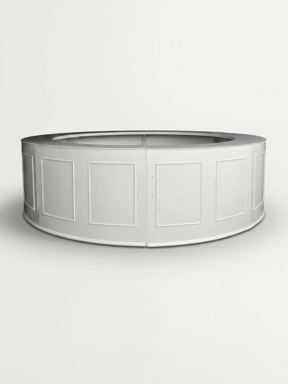 The White Shaker Bar is a large, circular metallic structure with rectangular panels and a hollow center, ideal as a striking event or wedding bar centerpiece. It is showcased against a plain white background.