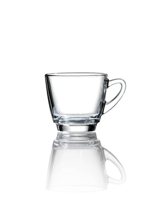 The Clarity Tea Cup & Saucer features a clear glass cup with a handle, resting empty on a white surface. Its minimalist design exudes elegance, and the cup casts a subtle reflection below.