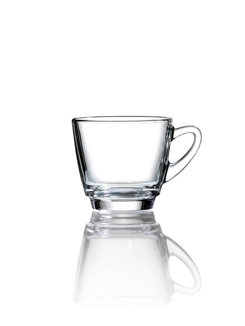 The Clarity Tea Cup & Saucer features a clear glass cup with a handle, resting empty on a white surface. Its minimalist design exudes elegance, and the cup casts a subtle reflection below.