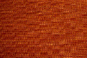 A Bright Orange table linen with a smooth refined texture that enhances tables with timeless elegance.