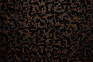 Table linen with intricate textures with subtle metallic accents bring bold style and luxurious charm to tablescapes.