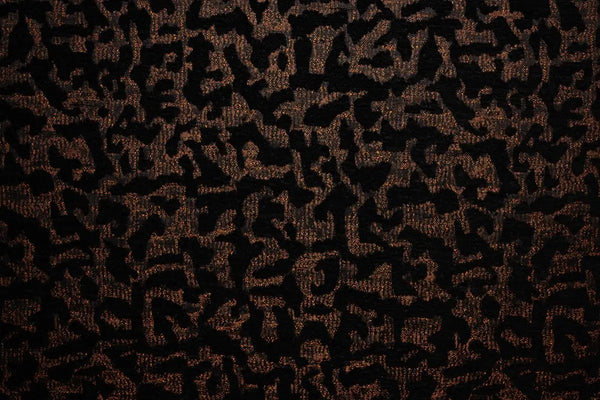 Table linen with intricate textures with subtle metallic accents bring bold style and luxurious charm to tablescapes.