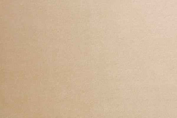 A Beige table linen with a luxurious texture that offers timeless elegance.