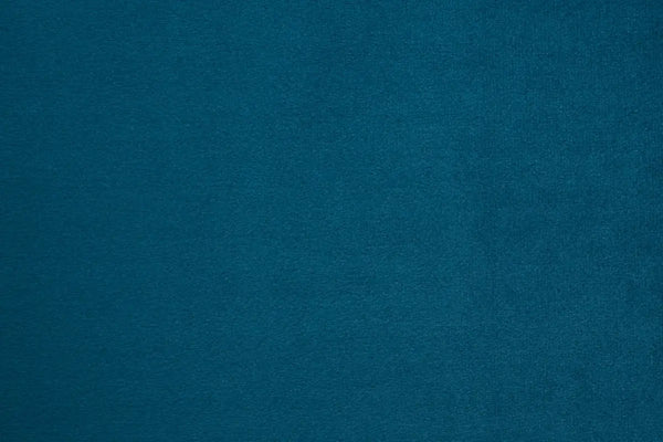 A Blue table linen with a luxurious texture that offers timeless elegance.