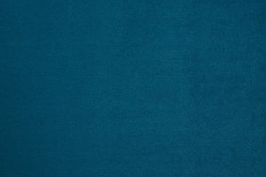 A Blue table linen with a luxurious texture that offers timeless elegance.