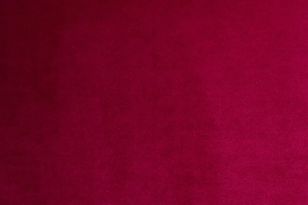A Burgundy table linen with a luxurious texture that offers timeless elegance.