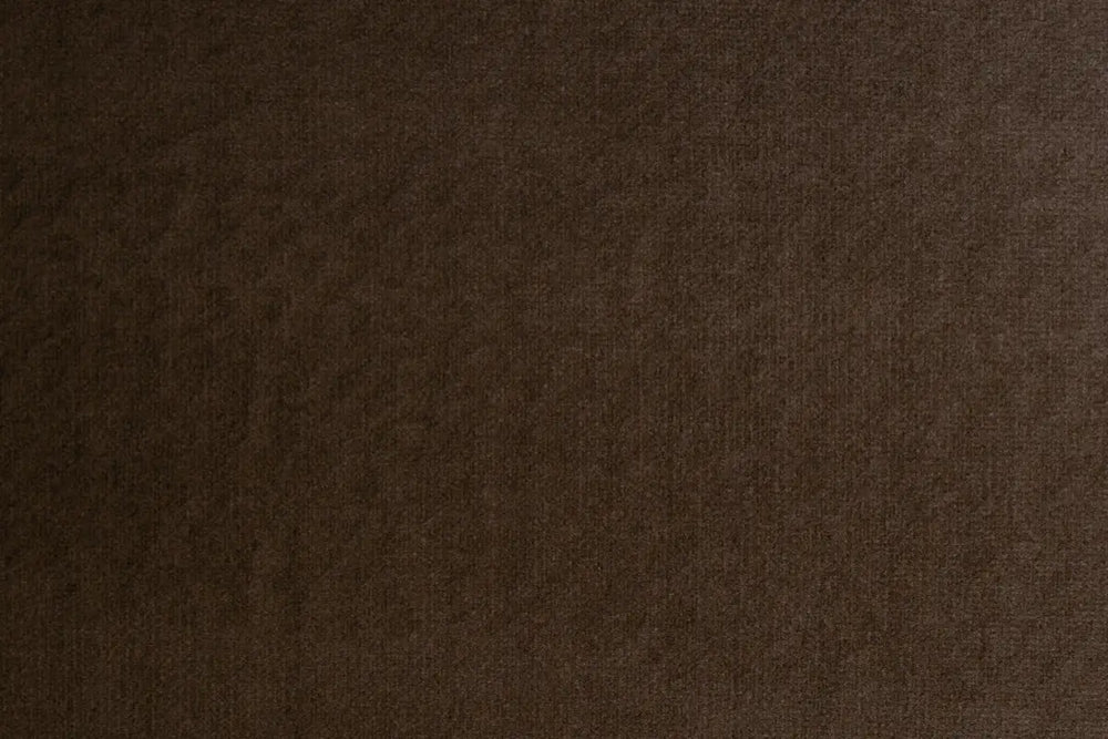 A Dark Chocolate table linen with a luxurious texture that offers timeless elegance.