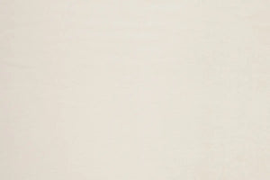 A Ivory table linen with a luxurious texture that offers timeless elegance.