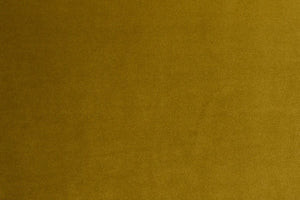 A Mustard table linen with a luxurious texture that offers timeless elegance.