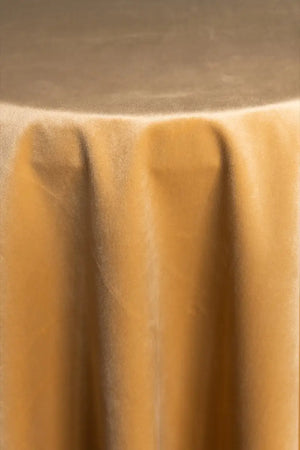 A Peach table linen with a luxurious texture that offers timeless elegance.