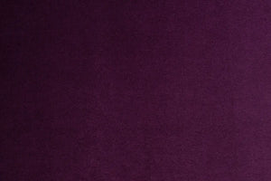 A Purple table linen with a luxurious texture that offers timeless elegance.