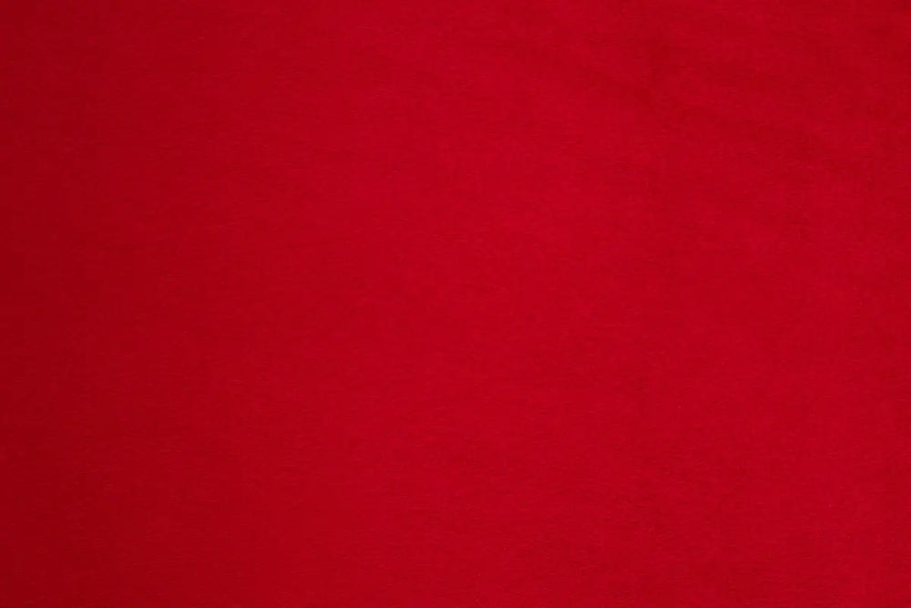 A Red table linen with a luxurious texture that offers timeless elegance.