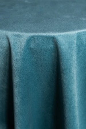 A Sea Green table linen with a luxurious texture that offers timeless elegance.