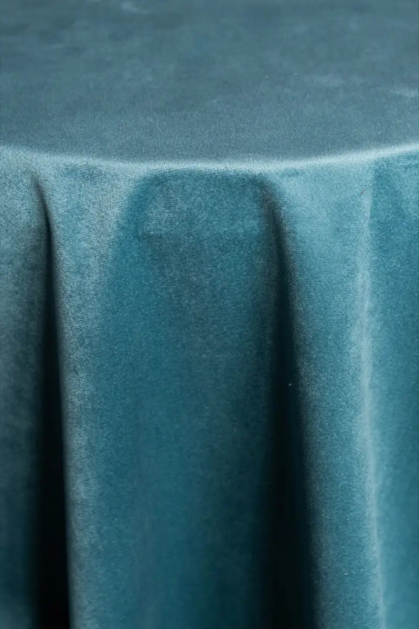 A Sea Green table linen with a luxurious texture that offers timeless elegance.