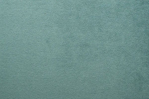 A Soft Green table linen with a luxurious texture that offers timeless elegance.