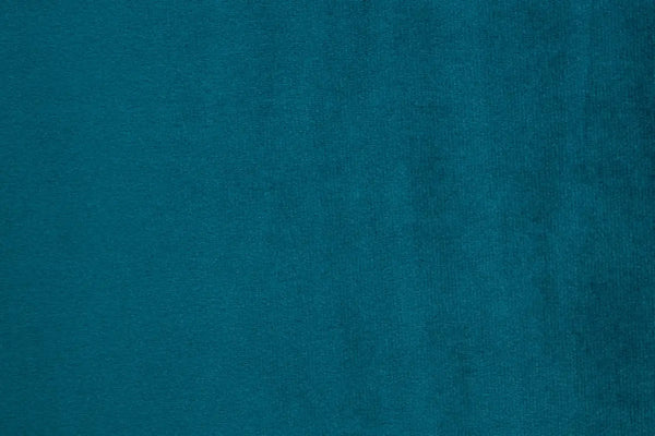 A Teal Green table linen with a luxurious texture that offers timeless elegance.
