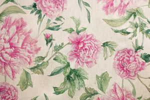 Table linen with soft pink florals infuse romantic charm and timeless beauty into elegant tablescapes.