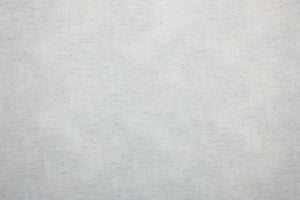 Table linen with natural texture adding warmth and understated elegance to minimalist, modern table settings.